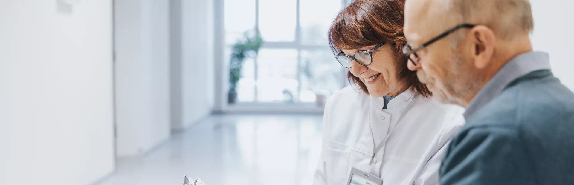 Healthcare professional talking with patient.