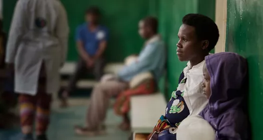 Young patients waiting outside hospital in Rwanda