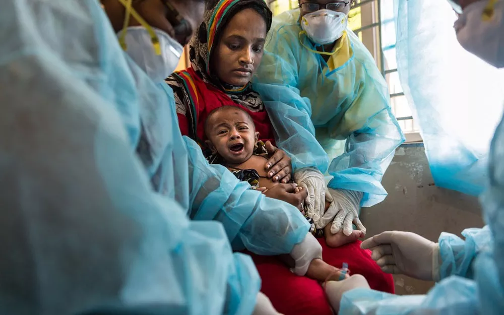 A blood sample is taken from Foysal at the clinic before he goes to the hospital, where he later recovered, thanks to antibiotics.