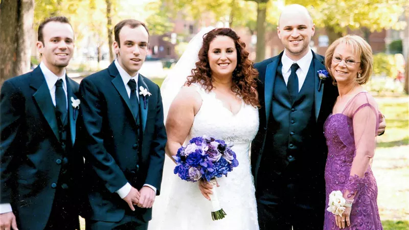 Spatz Caplan at a wedding with her family.