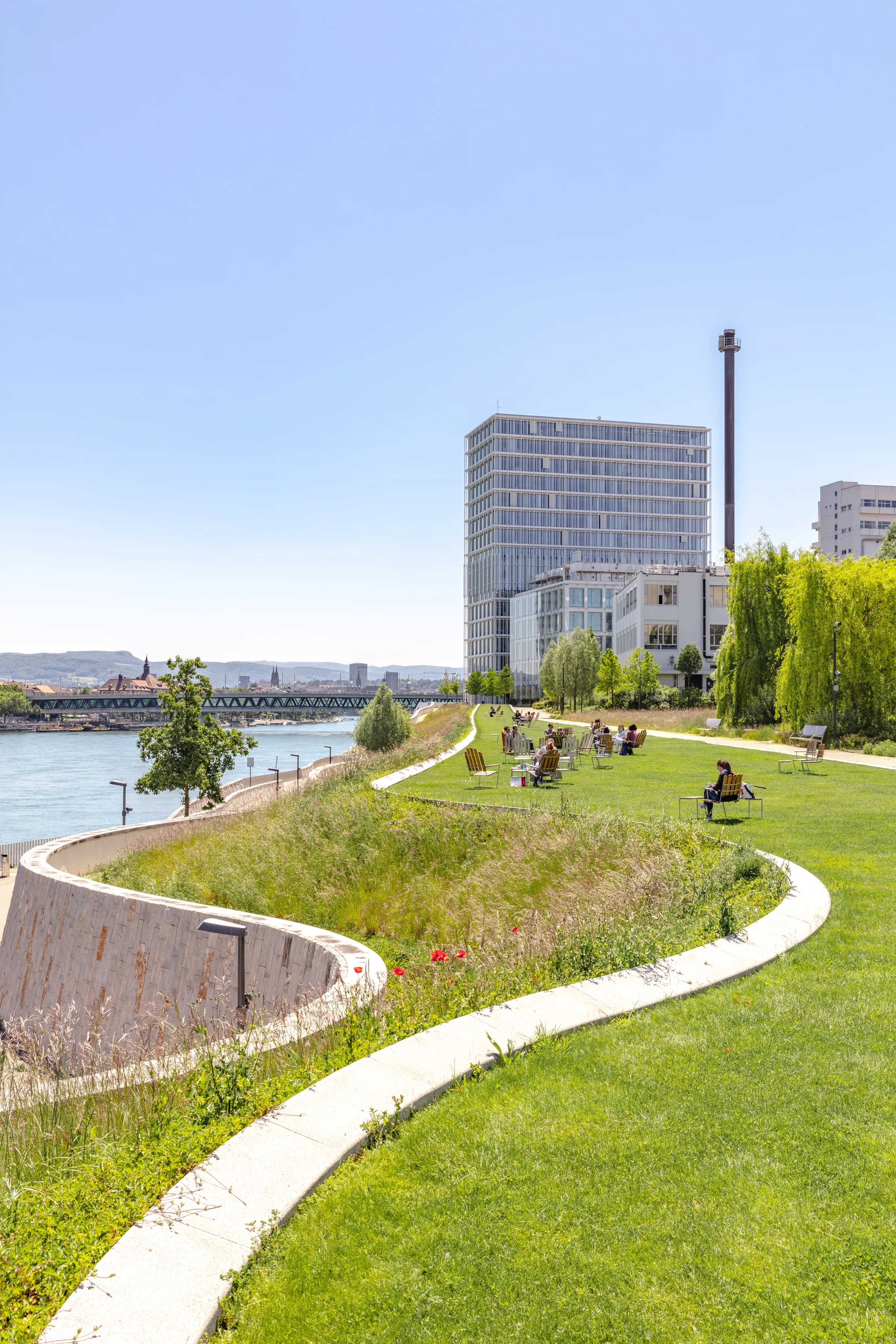 View of Asklepios 8 along the Rhine riverbank, Novartis Campus Basel