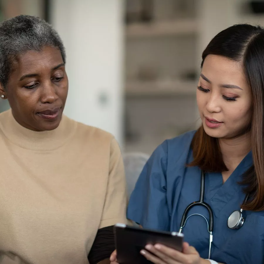 Healthcare professional talking to a patient