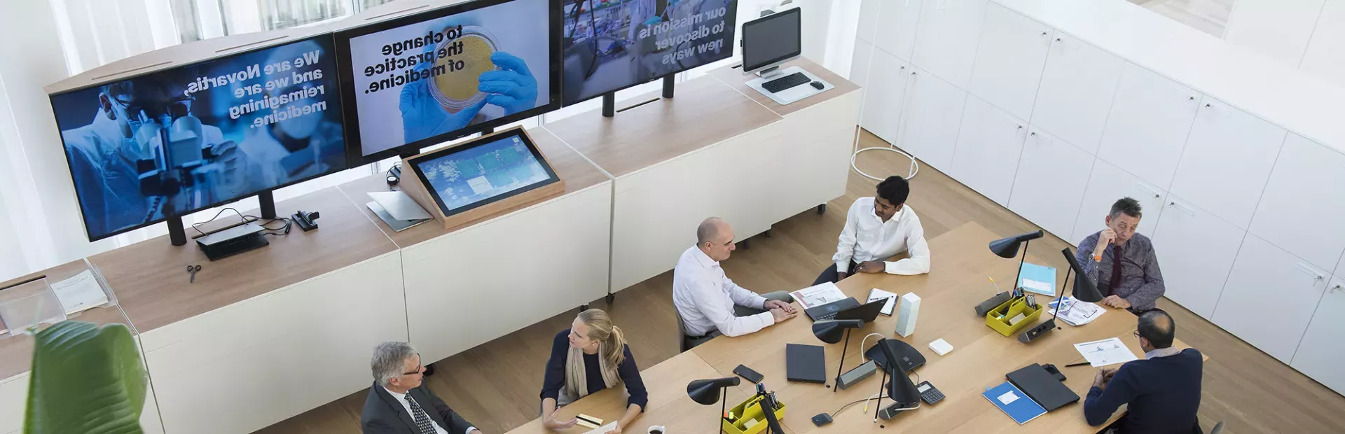 A photo of people in a meeting hall